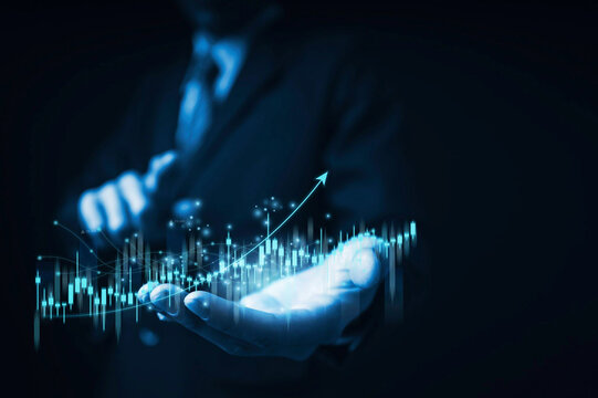 Image in blue tones, businessman or trader showing virtual chart, foreign exchange trading investment, investment and trading concept