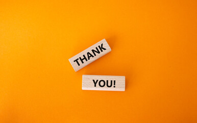 Start now symbol. Wooden blocks with words Start now. Beautiful orange background. Business and Start now concept. Copy space.