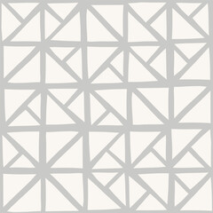 Seamless abstract pattern with white triangles on grey background
