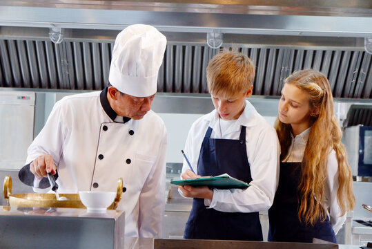 Chef teaches students how to cook.