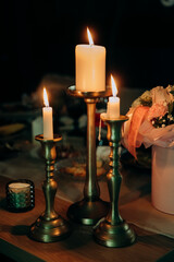 Magnificent decoration of a wedding ceremony with original details and candles.