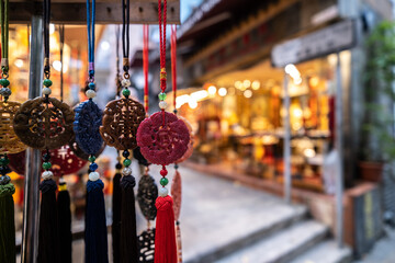 Hanging Chinese Jade Gem Stone in Souvenir Shop, Hong Kong - obrazy, fototapety, plakaty