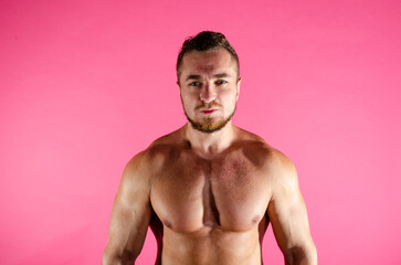 Fototapeta premium Fitness and healthy lifestyle. Young attractive man with a beautiful body.