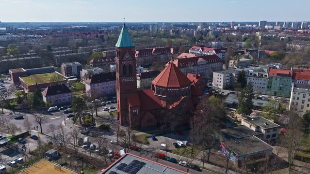Drone shot of Maria, Hilfe der Christen (Mary, help of the Christians ) . It is a Roman Catholic parish church in the Berlin district of Spandau , Germany