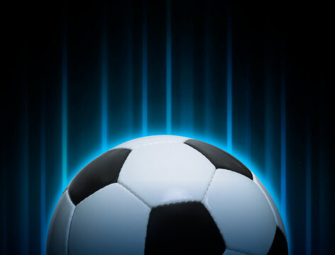 Football ball with abstract lights background. Football ball game concept