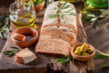 Tasty bread made of flour and green olives.