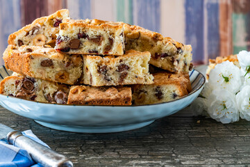 Easter mini chocolate egg traybake with hazelnuts and cranberries cut into squares