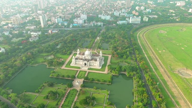 Kolkata: Aerial view of city in India, famous Victoria Memorial, large marble building on Maidan - landscape panorama of South Asia from above