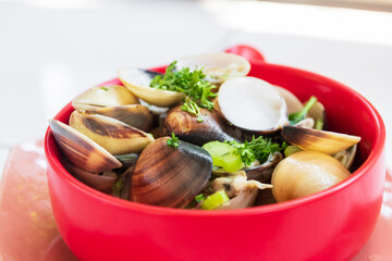 Vongole in white wine sauce. Clams cooked with white wine, herb and parsley.