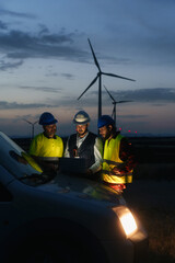 Electrical Engineer and technical specialists working on electricity wind power station project ,...