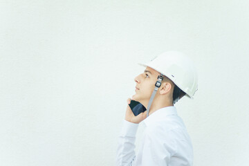 young engineer is talking on the phone