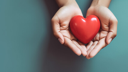 Hands Holding Red Heart - Symbolic of Health, Love, Organ Donation, and Mindfulness for World Health and Mental Health Days