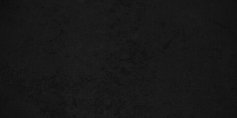 Obraz premium Dark black Close up retro plain dark black cement and concrete wall background texture. Background image of texture plaster on the wall in dark black tones in grunge style backdrop.