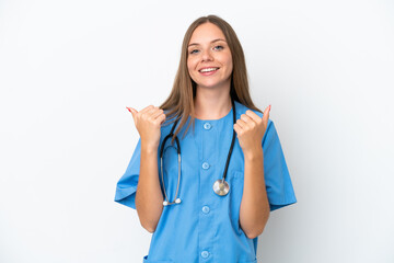 Young surgeon doctor Lithuanian woman isolated on white background with thumbs up gesture and smiling