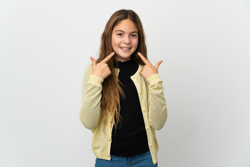 Little girl over isolated white background giving a thumbs up gesture