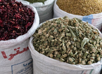 Hurghada, Egypt - September 1, 2021: Market in Egypt. Dried peppers in bags. Trading in a market in...