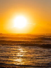 Beautiful sunrise on the beach coastline.