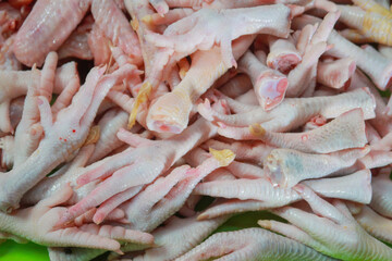 pile of fresh raw chicken legs, top view