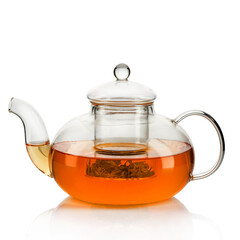 Isolated Teapot with tea. On white.