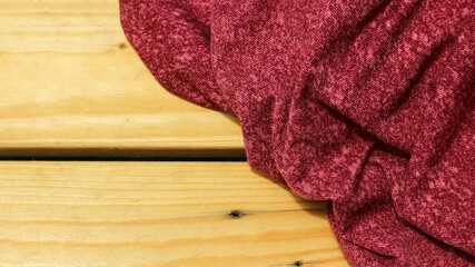 Red fabric texture for the background.