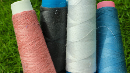 Colorful yarn spools used in the fabric and textile industry