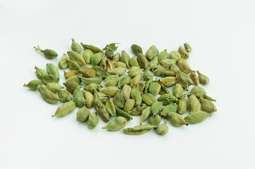 dried cardamom seeds isolated on white background