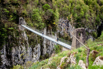 Magnificent landscape of the Pyrenees mountains with the Holzarté footbridge above the gorges