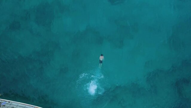 Man swimming in ocean