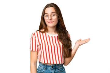 Teenager girl over isolated chroma key background holding copyspace imaginary on the palm to insert an ad