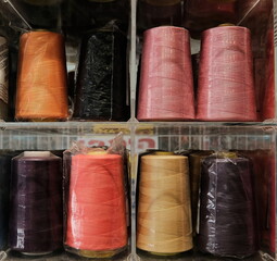 Multi-colored threads for household and industrial sewing machines and overlockers.
Sewing threads.