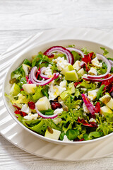 Green Salad with Apple, Cheese, Cranberry in bowl
