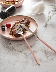 Stainless steel tableware and kitchen utensils placed on the desktop