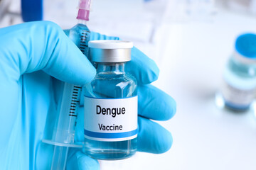Dengue vaccine in a vial, immunization and treatment of infection - obrazy, fototapety, plakaty