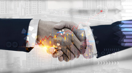 Businessman shaking hands with investors with global network connection and stock market chart graph and city background. digital technology internet