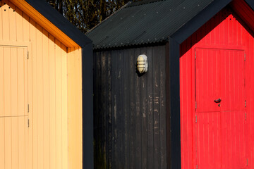 Brightly Coloured Beach Huts at a Coastal Location