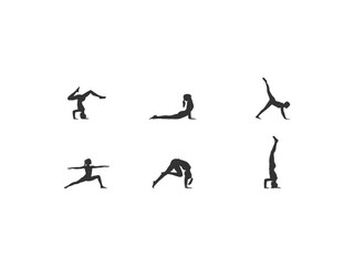 Yoga Workout.Silhouettes of a woman in Tree, Sirsasana, Boat, Warrior one, two, three, downwards and upwards facing dog, lotus, headstand poses.healthy and beauty.isolated on white background.