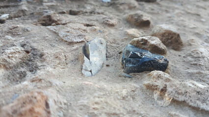 Background. Old concrete. Stones in concrete