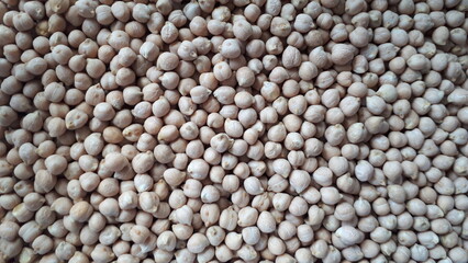 Background. Chickpeas. A scattering of cereals.