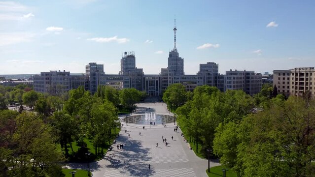 Aerial view on Derzhprom building with fountain and green park in spring on Freedom (Svobody) Square in Kharkiv city, Ukraine
