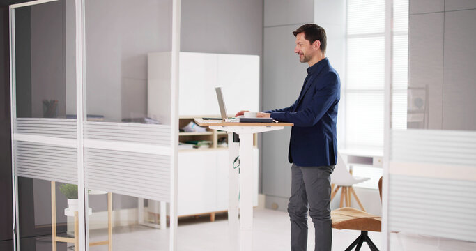 Adjustable Height Desk Stand In Office