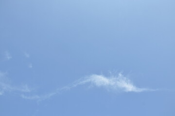 cloud spreading on bright sky in sunny day