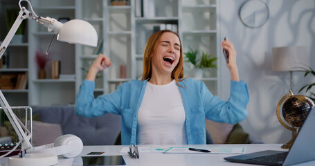 Portrait of happy woman use smartphone typing browsing found out great win good news celebrate...