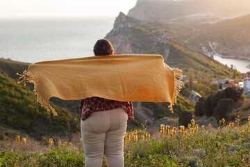 girl on the top of mountain