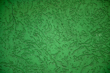 Green wall close up. Abstract background of painted green wall.