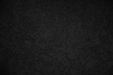 Black wall close up. Abstract background of painted black wall.