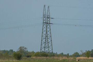 high voltage pylons in the field