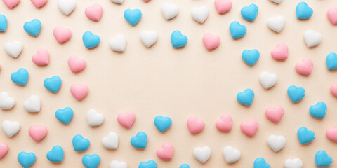 Transgender pride banner with hearts in the colors of the flag on a background and copy space for LGBTQIA+ Pride month, love diversity celebration, flat lay view in 3D illustration