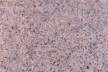 Granite surface close up. Granite stone texture background. Detail of granite stone surface.