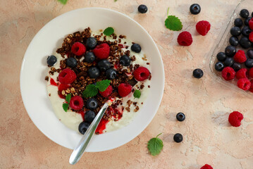 Granola with greek Jogurt and fresh  berries. style hugge.