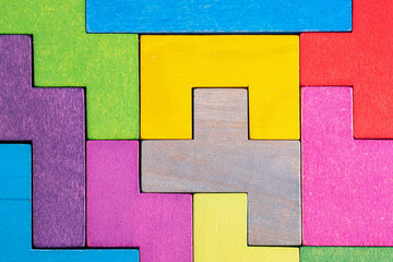 Abstract Background. Background with different colorful shapes wooden blocks.